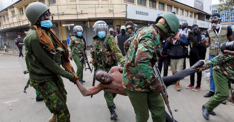 Use of Guns to Silence Dissent:  Examining the Implications of  the Use of Excessive Force and  the Militarization of Peaceful  Assembly Kenya